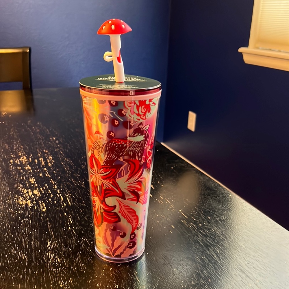 Starbucks 24 ounce travel tumbler.  Woodland theme holiday 2022